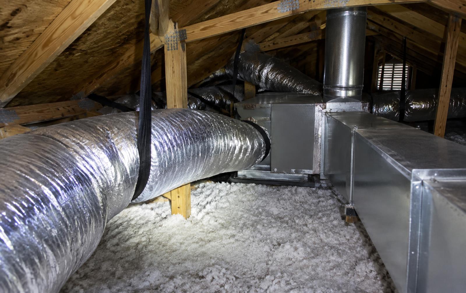 Insulated flexible ductwork and metal supply ducts in the attic of a Florida home during inspection